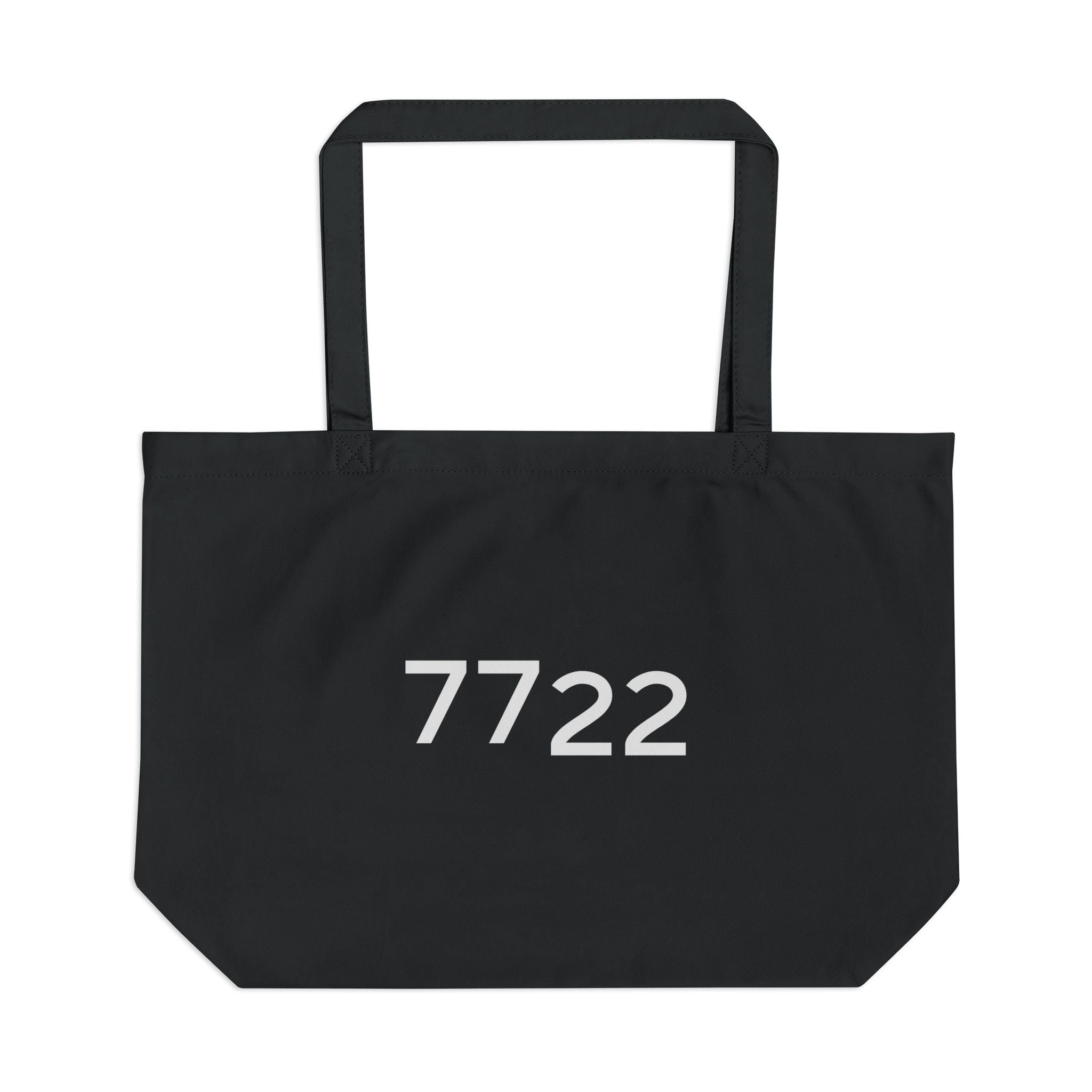 Black tote bag with '7722' printed on a white background