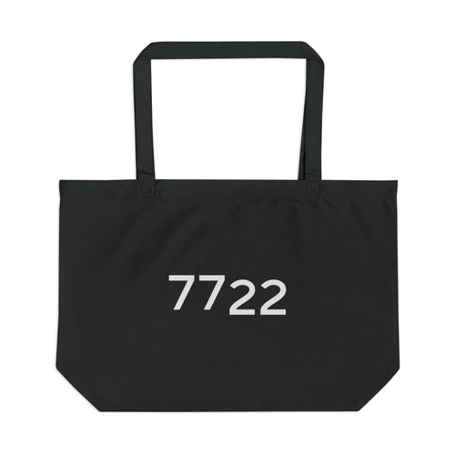 Black tote bag with '7722' printed on a white background