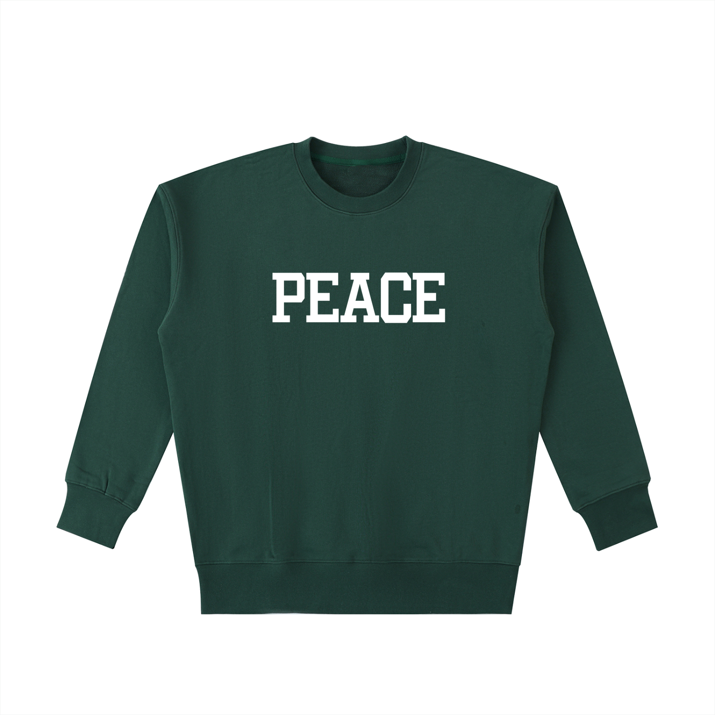 Front view of a forest green heavyweight crewneck with "NAMASTE" arched in white varsity-style lettering, featuring a premium oversized silhouette.