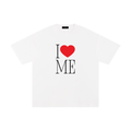 Unisex white 100% cotton tee featuring a large red heart and black "I ME" typography.