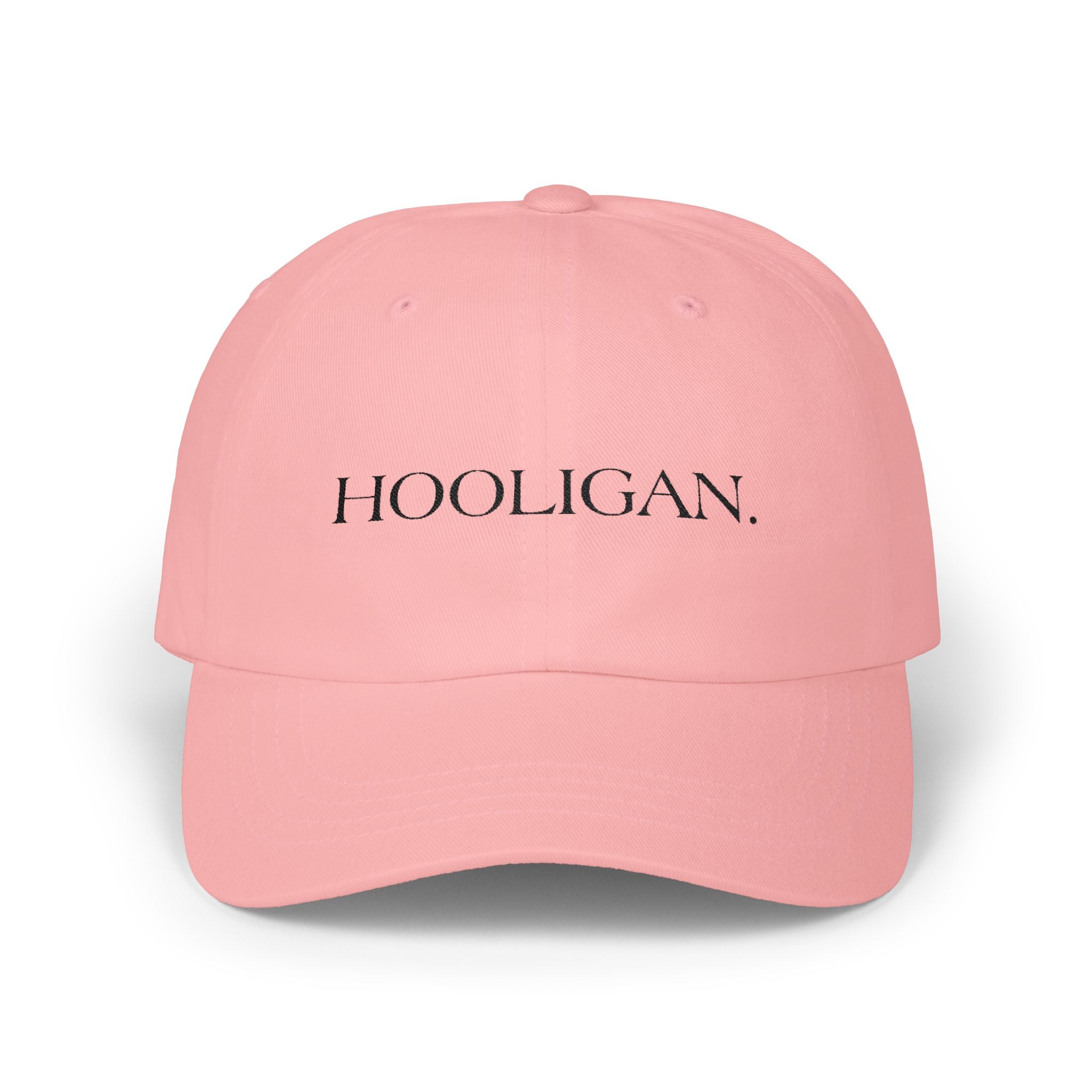 Pink cap with 'HOOLIGAN.' text on a white background